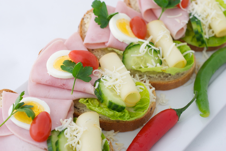 Fresh Canape with ham, cheese and eggの写真素材