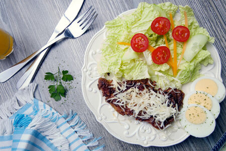 Fresh steak meat with vegetable and cheeseの写真素材
