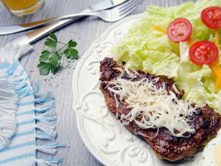 Fresh steak meat with vegetable and cheeseの写真素材