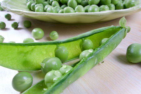 Green healthy vegetarian raw food of peasの写真素材