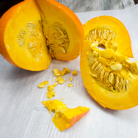 Orange vibrant pumpkin with seedsの写真素材