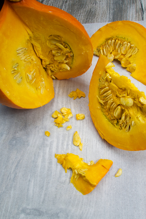 Orange vibrant pumpkin with seedsの写真素材