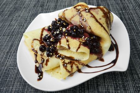 pancake with blueberries and chocolateの写真素材