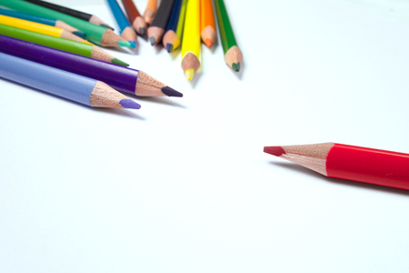 Business concepts: red crayon standing out from the crowdの写真素材