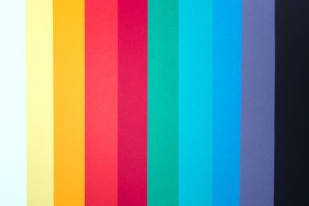 Colored group of empty papers on office desk for notesの写真素材