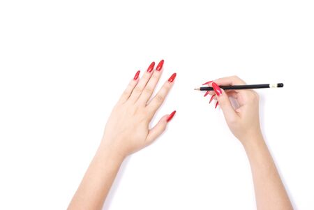 Woman hand with red nails gesturesの写真素材