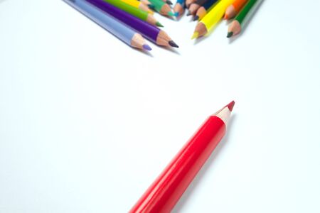 Business concepts: red crayon standing out from the crowdの写真素材