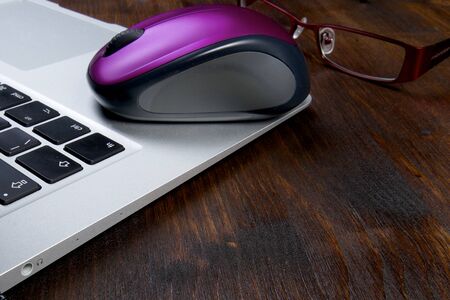 Computer mouse with notebookの写真素材