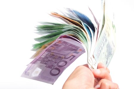 Euro money in a hand