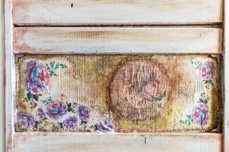 DIY concept, repair and renovation of old wooden furniture with floral decorationの写真素材