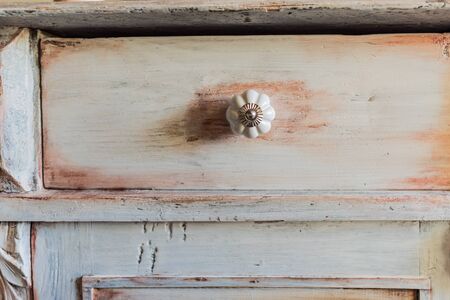 DIY concept, repair and renovation of old wooden furniture with floral decorationの写真素材