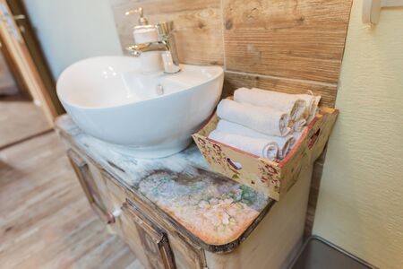 DIY concept. Ceramic handmade decorative furniture in bathroom. Retro style....