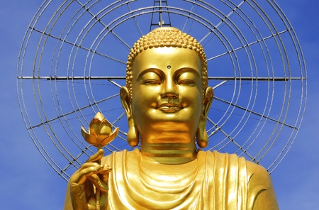 Big Golden Buddha with Lotus Flower at Da Lat, Vietnamの写真素材