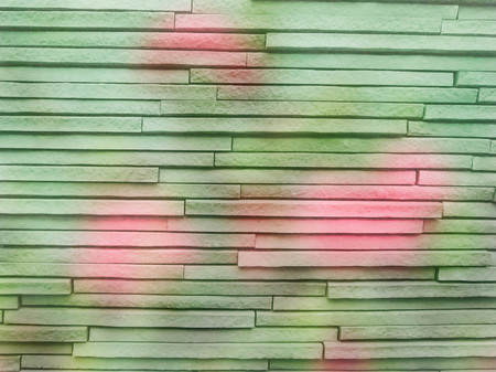 abstract background , pink flower image overlay with brick wall imageの写真素材