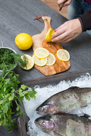 Fresh trout with lemonの写真素材