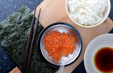 Salmon roe with rice and ingredients in Japanese food style.の写真素材