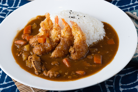 Japanese curry with fried shrimps topping.の写真素材