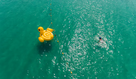 Top view of the sea and the lifebouy with outdoor sun lighting.の写真素材