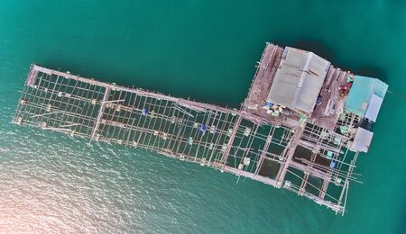 Top view from sky of floating sea house outdoor sun lighting.の写真素材