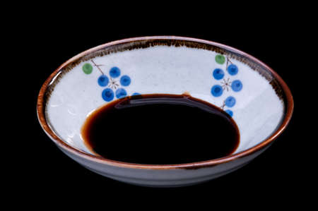 Japanese sweet shoyu sauce with black background.の写真素材