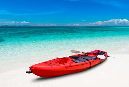 Blue sea beach and kayak boat with outdoor sun lighting.の写真素材