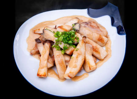 King oyster mushroom fried with miso sauce in Japanese style.の写真素材