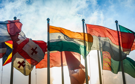 International flag association In the wind, swaying with blue sky and cloudの写真素材