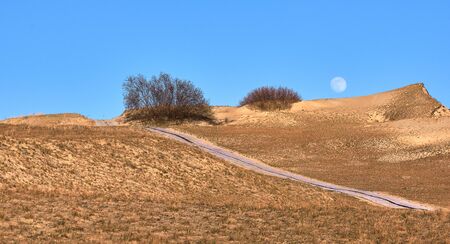View of nordic sand dunes and pathways, Baltic sea at Curonian spit, Nida, Klaipeda, Lithuaniaの写真素材