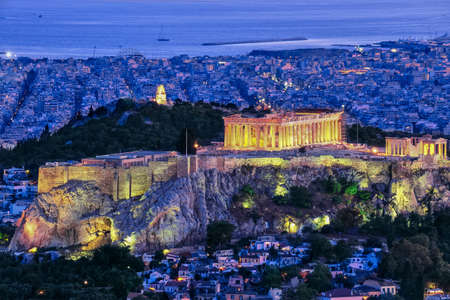 Close view of Acropolis hill  Parthenon and Erechtheion and Philoppapos monument at night, Athens, Greece.    site.の写真素材