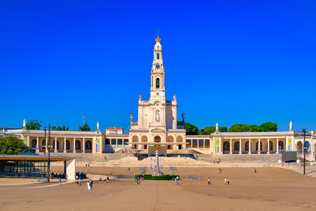 Basilica of Our Lady of Rosary of Fatima, Portugal, on sunny day.の写真素材