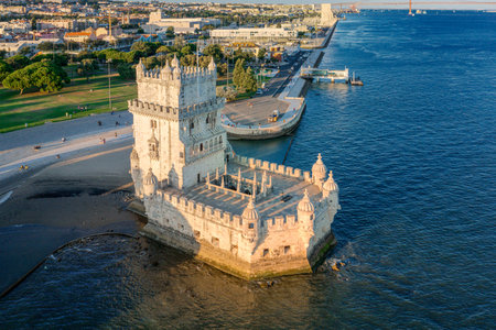 Drone view of Belem tower and its surroundings, Lisbon, Portugal at summer day. Medieval fortification on Tagus river in late Gothic or Manueline style, UNESCO world heritage site, Age of Discoveries, tourist attraction, Portuguese seafaring historyの写真素材