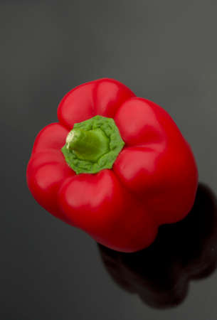 An Artistic Red Pepper with Reflection