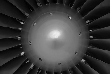 The central hub of a turbine engine, a powerful symbol of industry, technology and progressの写真素材