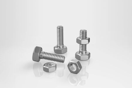 Bolts and nuts on a gray backgroundの写真素材