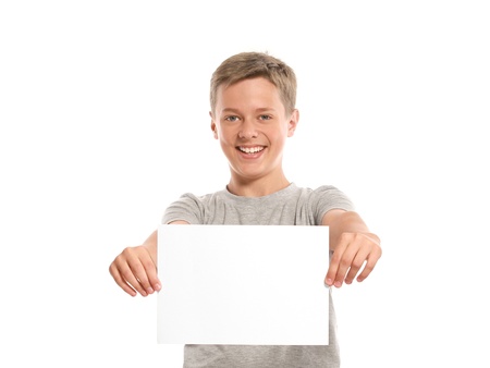 Smiling boy hold white blank paper. Isolated on white background の写真素材