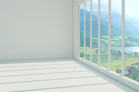 Empty white room with beautiful views from the windowの写真素材