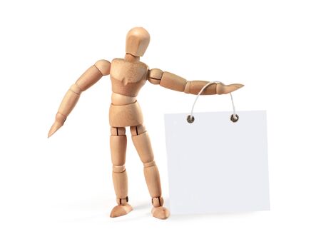 Wooden man holding blank poster on white, with clipping pathの写真素材