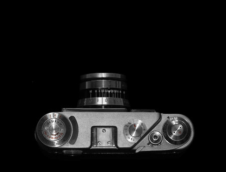 Kiev, Ukraine - May 12, 2016: Film camera FED 4, produced between 1969-1980 in Ukraine. Top view on black backgroundのeditorial素材