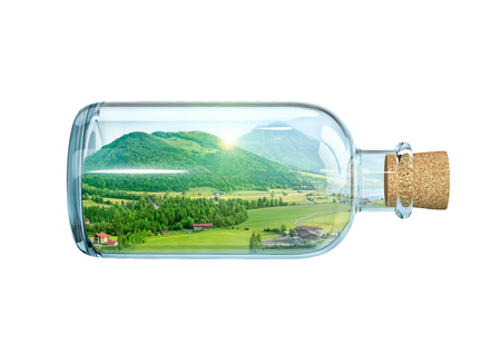 Mountain landscape in the bottle. Collage isolated on white. 3D rendering with clipping pathの写真素材