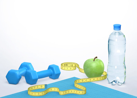 Losing weight and healthy lifestyle concept. Dumbbells, measuring tape, green apple and a bottle of waterの写真素材