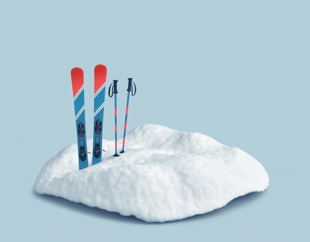 Ski in snow on blue background. Winter holidays and skiing concept. 3D renderingの写真素材