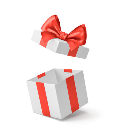 White open gift box with red ribbon and bow isolated on white.の写真素材