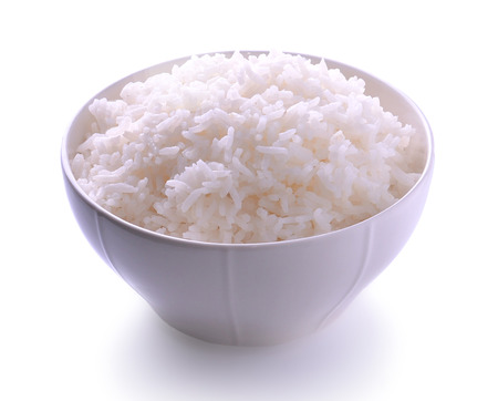 bowl full of rice on white with clipping pathの写真素材