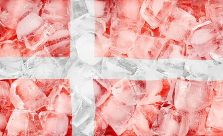 denmark flag on ice cubes backgroundの写真素材