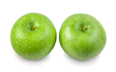 green apple isolated on a white background, photographyの写真素材