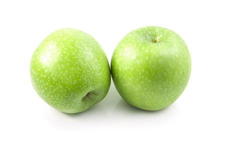green apple isolated on a white background, photographyの写真素材
