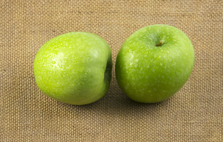 green apple isolated on a white background, photographyの写真素材