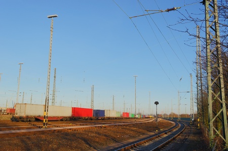 A freight yard under a beautiful blue sky の写真素材