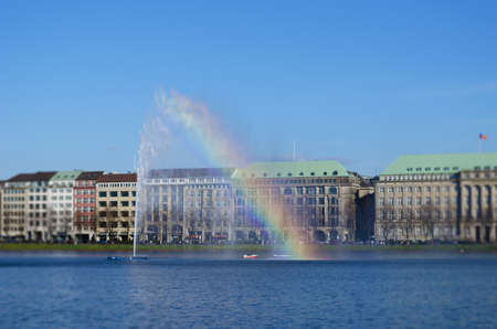 Rainbow effect on the Alster fountain in Hamburg  Lens blur の写真素材