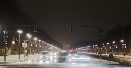 Winter traffic in Berlin  The SiegessÃ¤ule can be seen in the background の写真素材